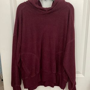 A nice hoodie. Light weight. Has one pocket on each side of the front.